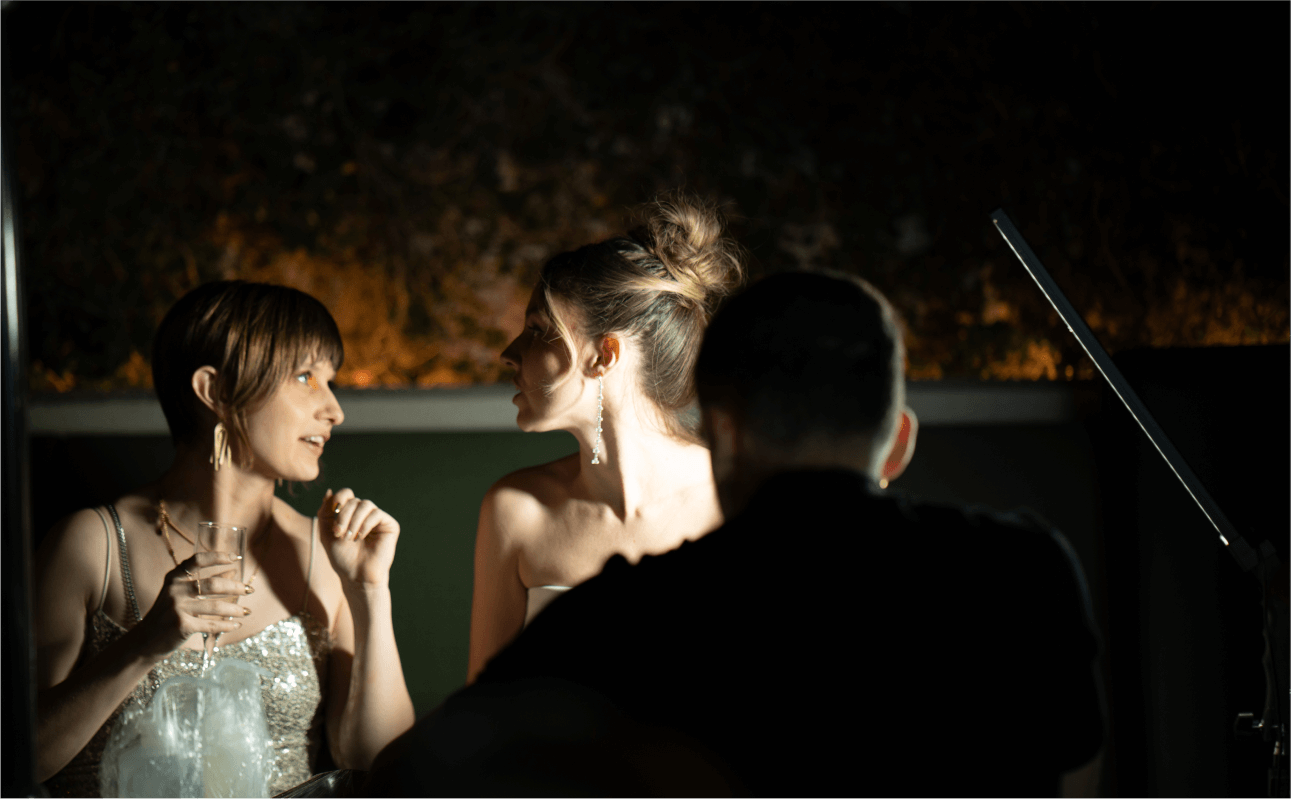 Attendees enjoying custom tattoos at a brand activation event, with professional artists creating personalized designs to enhance the experience.